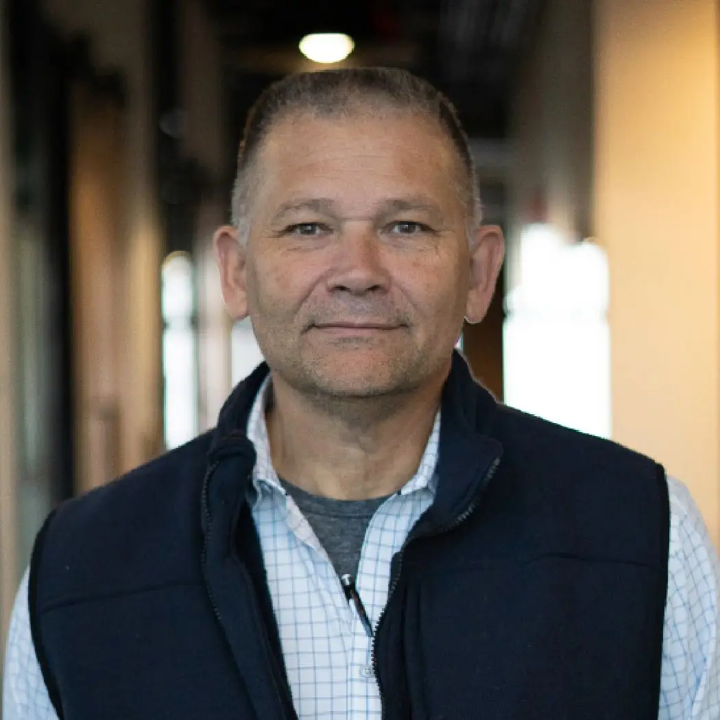 Headshot of Rusty von Querner